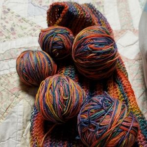 5 NWOT sock yarn balls,and crocheted strip
